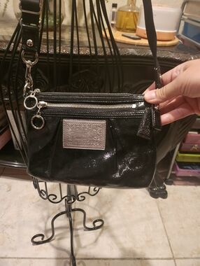 Coach Poppy black patent leather crossbody bag